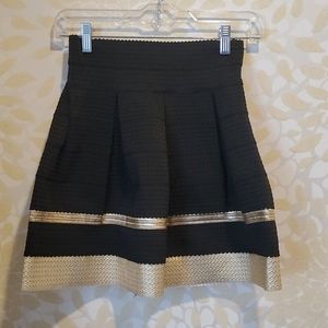 Black and gold mini skirt